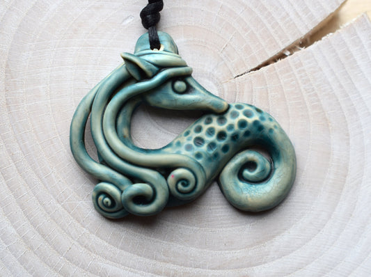 Kelpie/Water Dragon pendant, hand sculpted from polymer clay